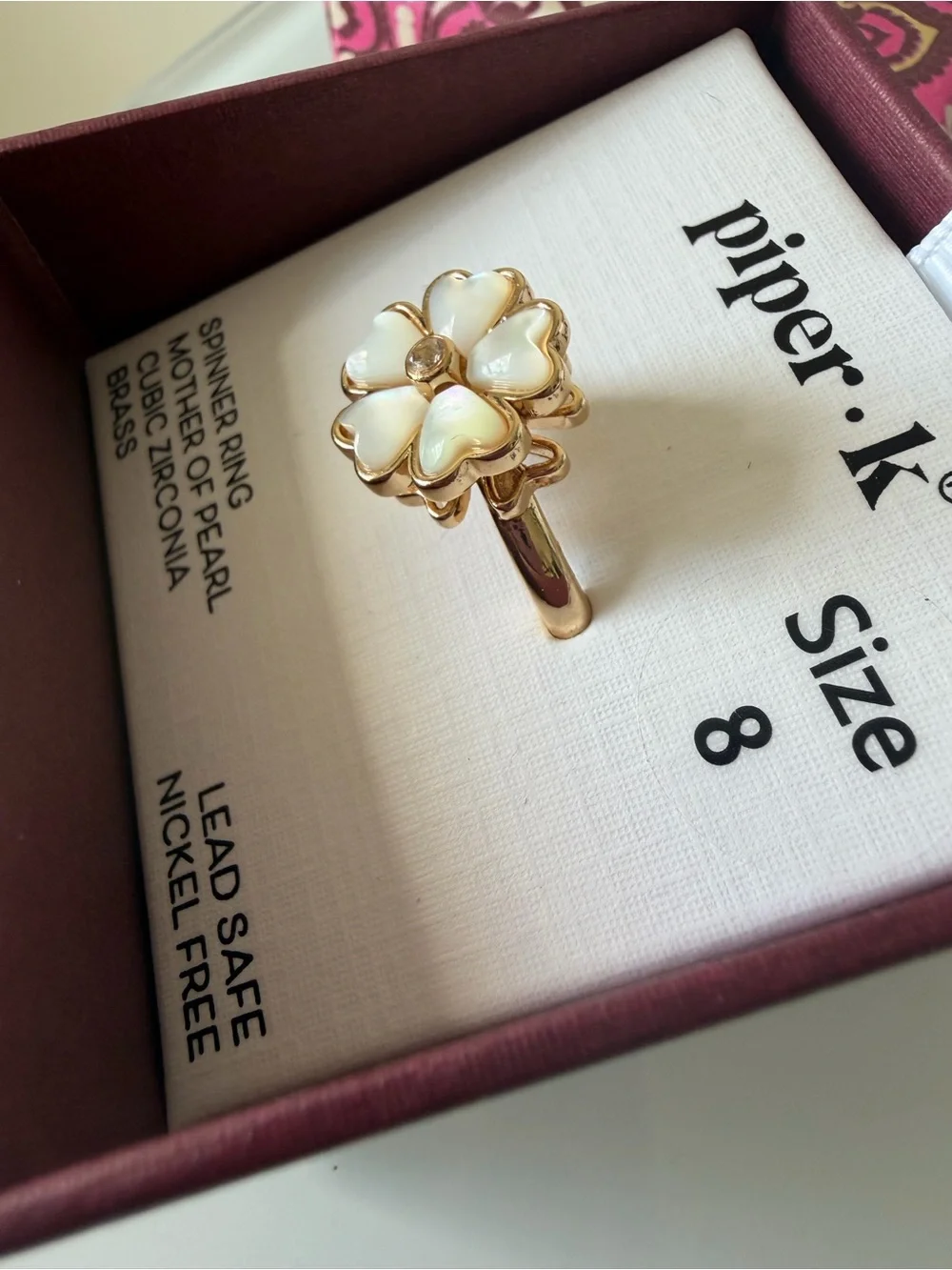 Gold Mother-of-Pearl Flower cubic zirconia spinner Ring
